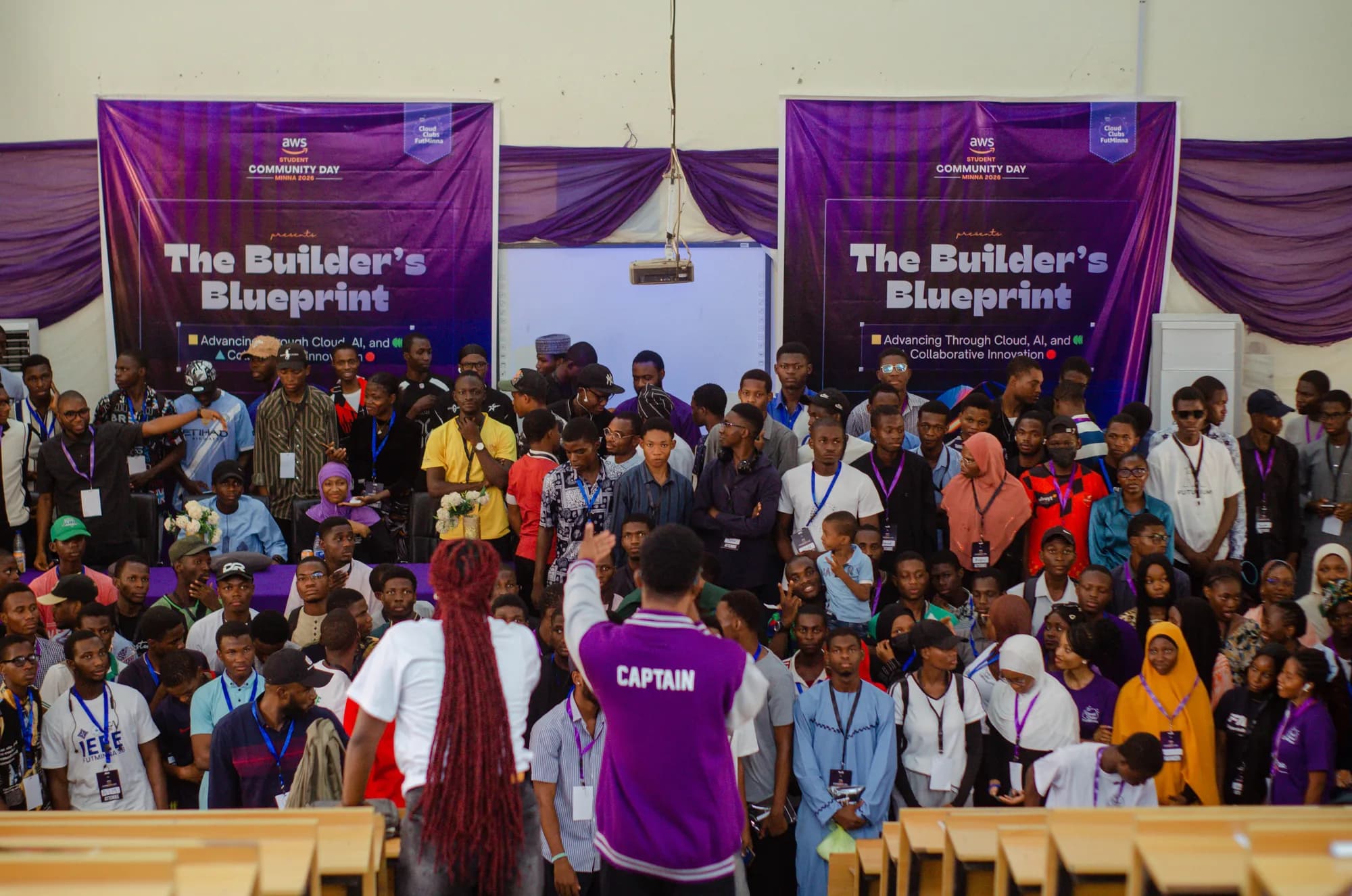 Attendees at AWS Student Community Day Minna, “The Builder’s Blueprint”, with Abraham in the Captain jacket