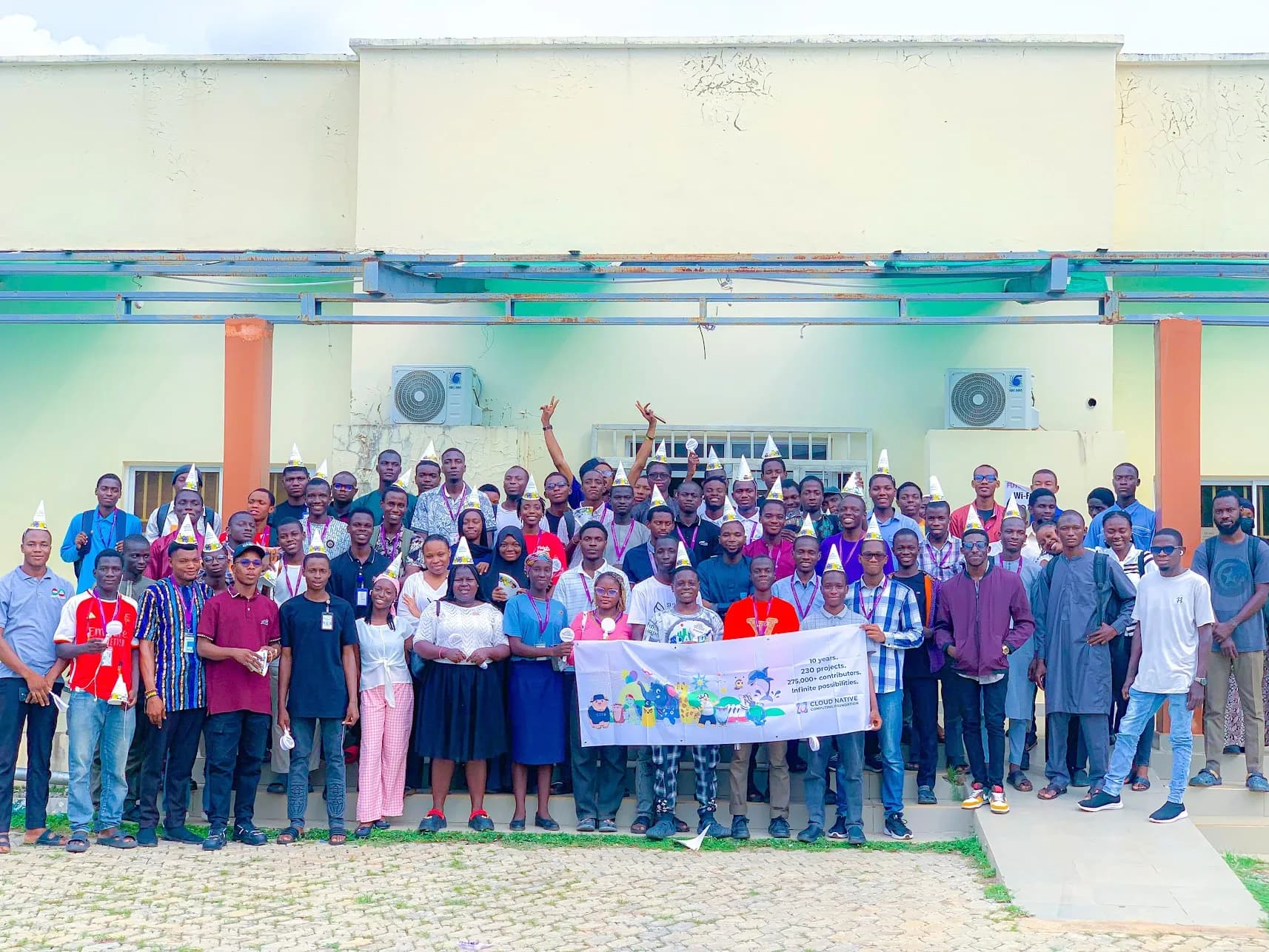 Group photo of the CNCF Minna community at a meetup