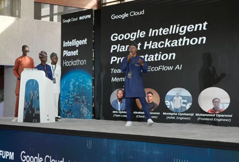 Presenting EcoFlow AI on stage at the Google Intelligent Planet Hackathon, KFUPM