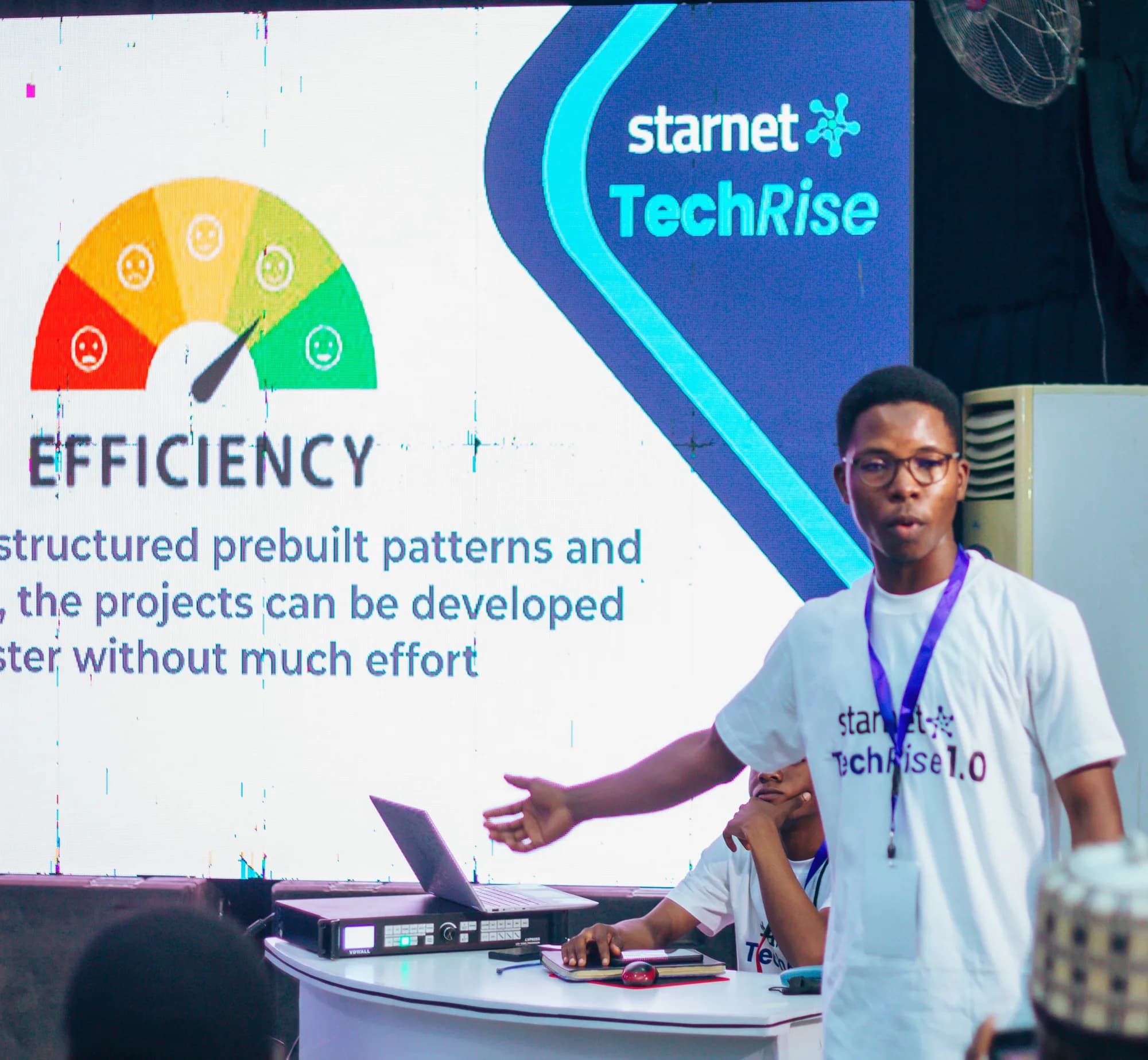 Speaking on stage at TechRise 1.0